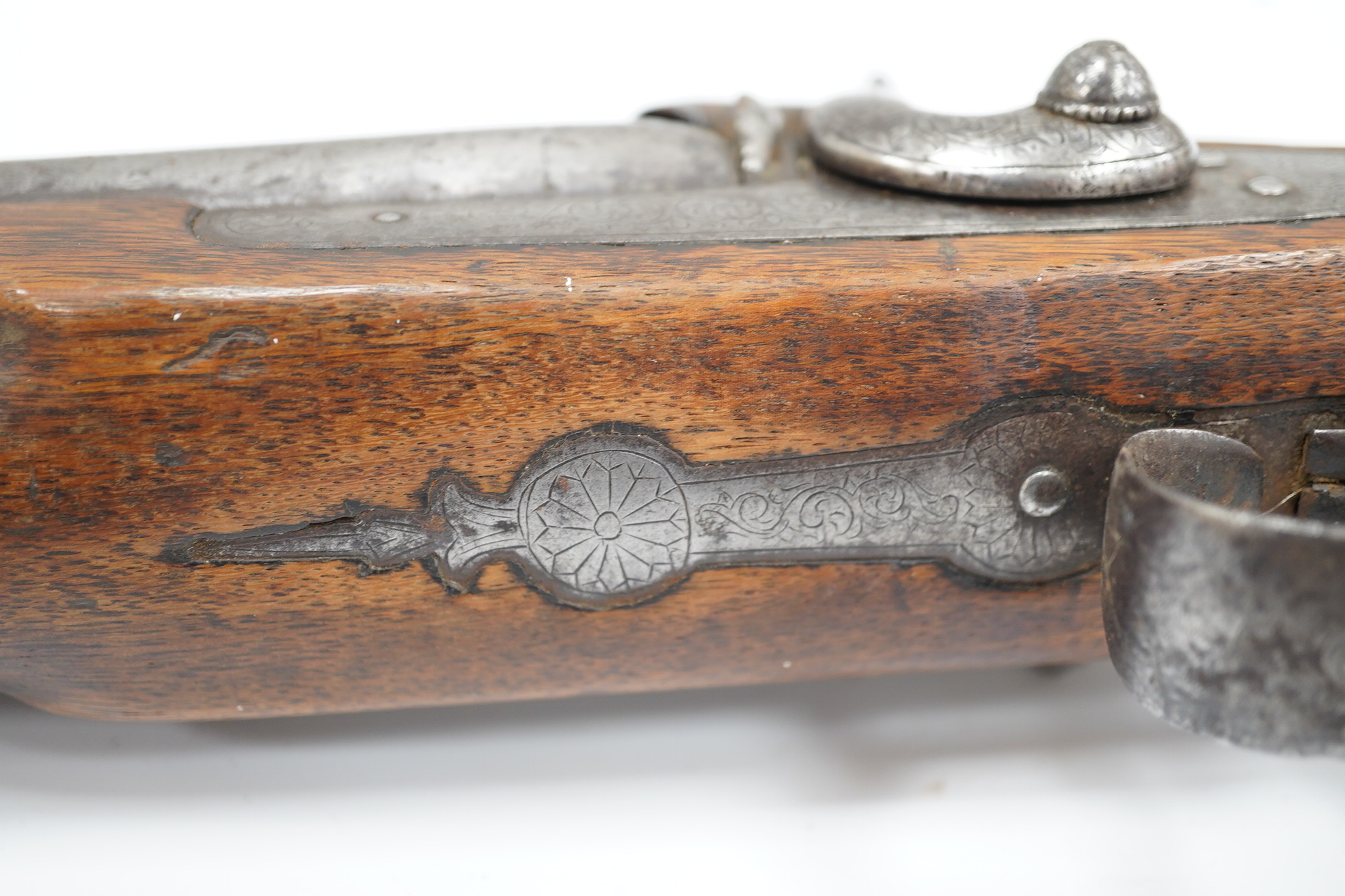 A Turkish flintlock Kubar pistol, with fully stocked brass mounts, polished steel lock and barrel (well worn), barrel 31cm, and a double barrel 12 bore percussion pistol cut down from a sporting gun, barrel 26.5cm, (2).